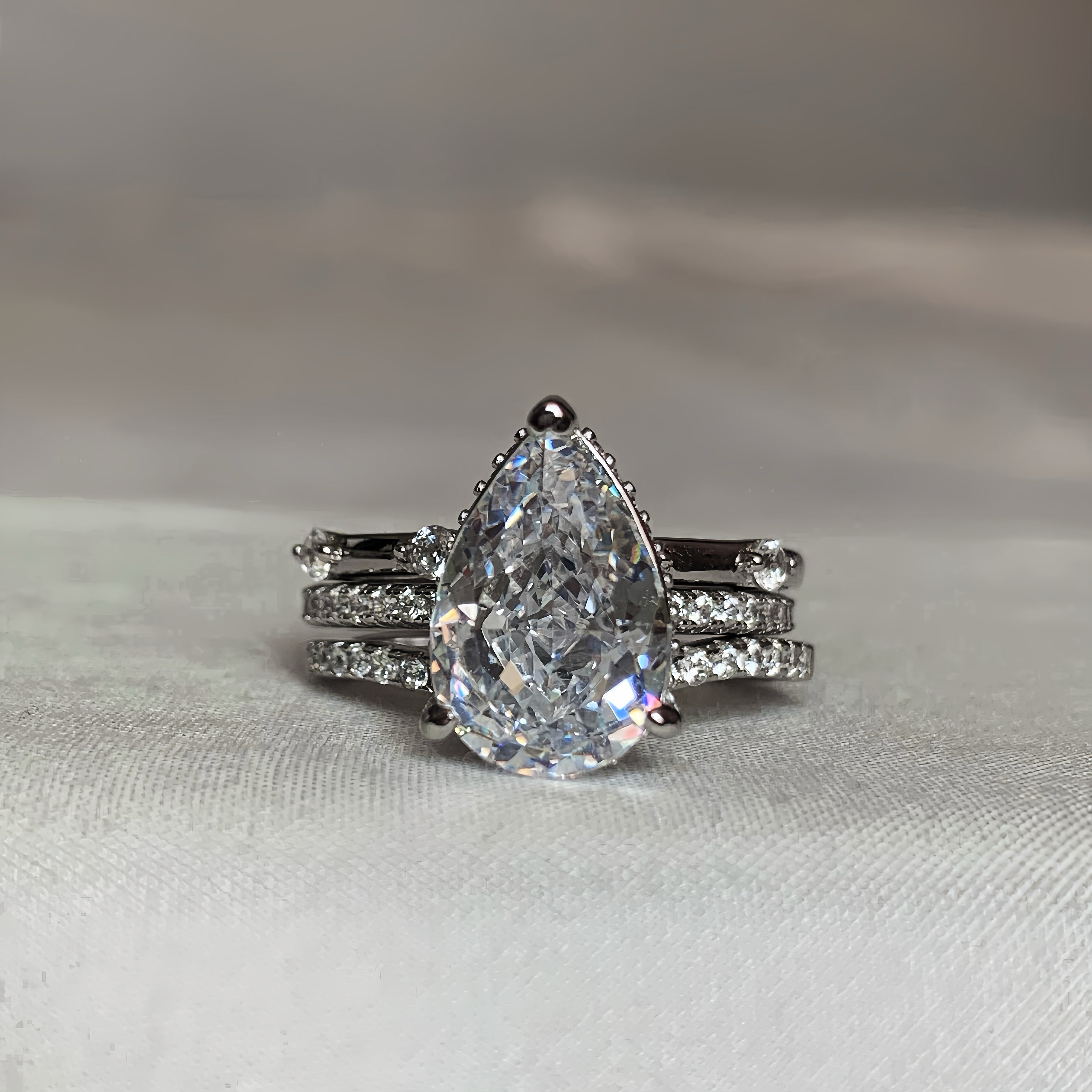 Enchanted Luster 3.0 Carat Pear Cut 3-Piece Wedding Set in Sterling Silver