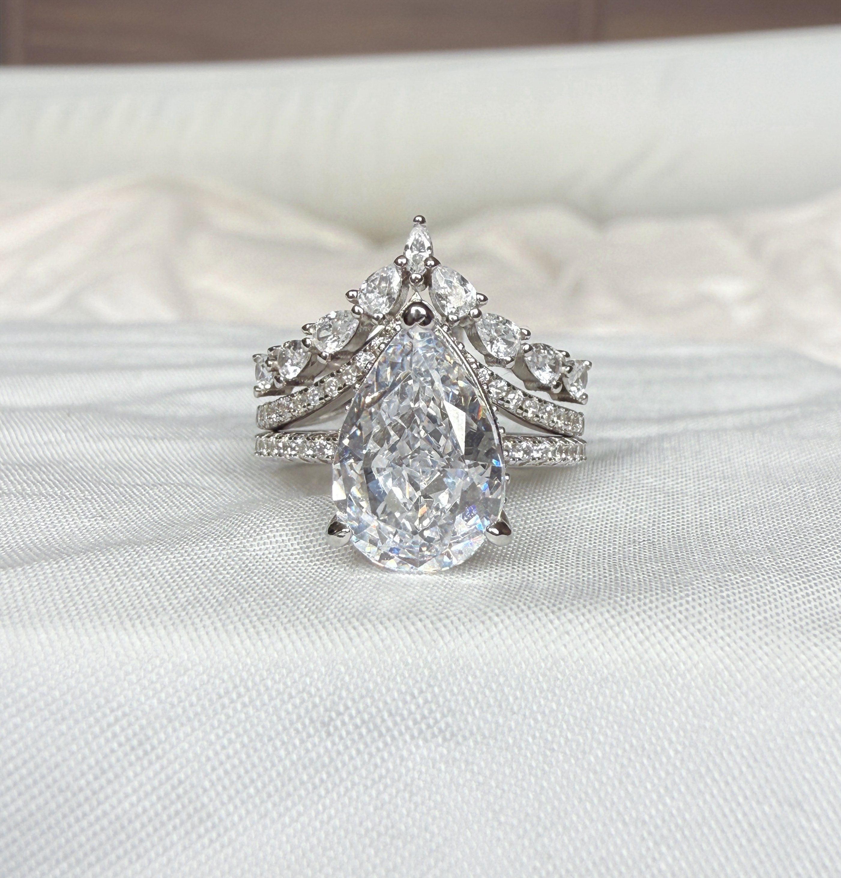 Enchanting Spark 3.0 Carat Pear Cut 2-Piece Wedding Set in Sterling Silver