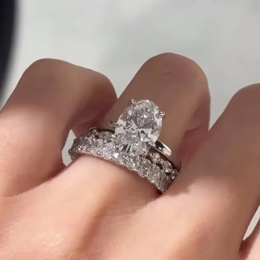 Regal Whisper 5.5 Carat Oval Cut Wedding Set in Sterling Silver