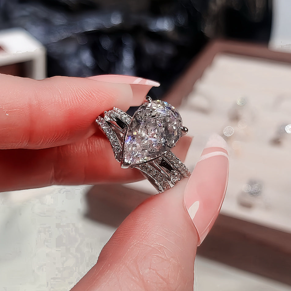 Enchanted Luster 3.0 Carat Pear Cut 3-Piece Wedding Set in Sterling Silver