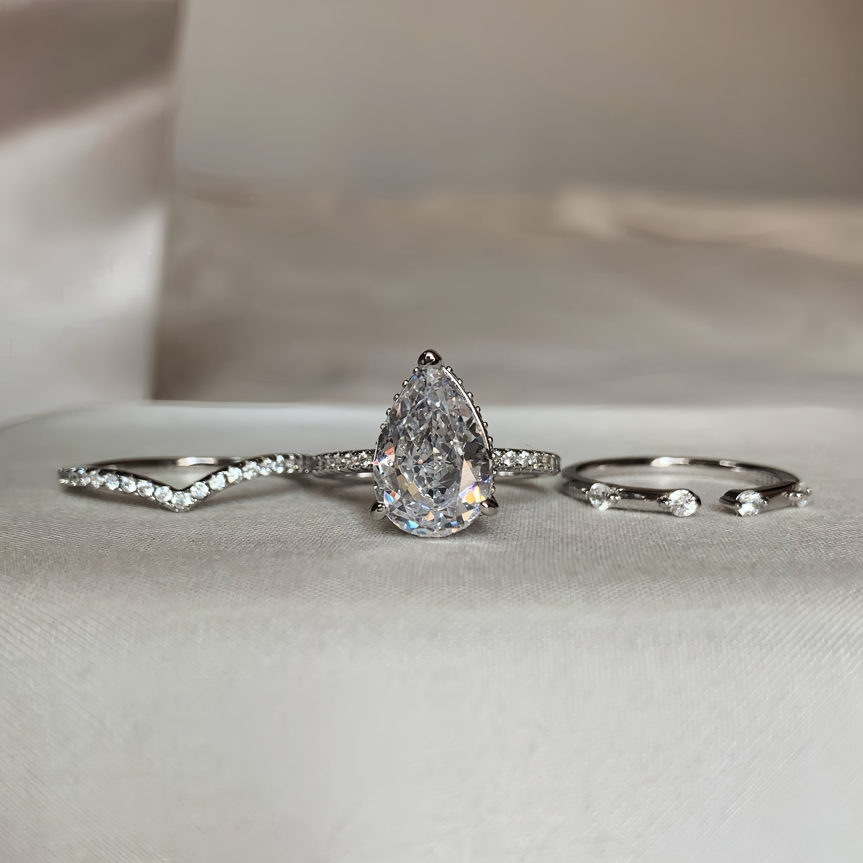 Enchanted Luster 3.0 Carat Pear Cut 3-Piece Wedding Set in Sterling Silver