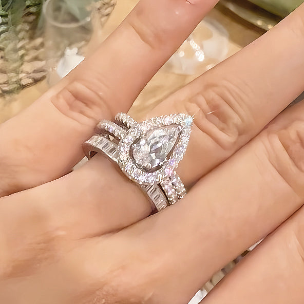 Trinity Glow 1.5 Carat Pear Cut 3-Piece Wedding Set in Sterling Silver