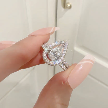 Petal Drop 1.5 Carat Pear Cut 2-Piece Wedding Set in Sterling Silver