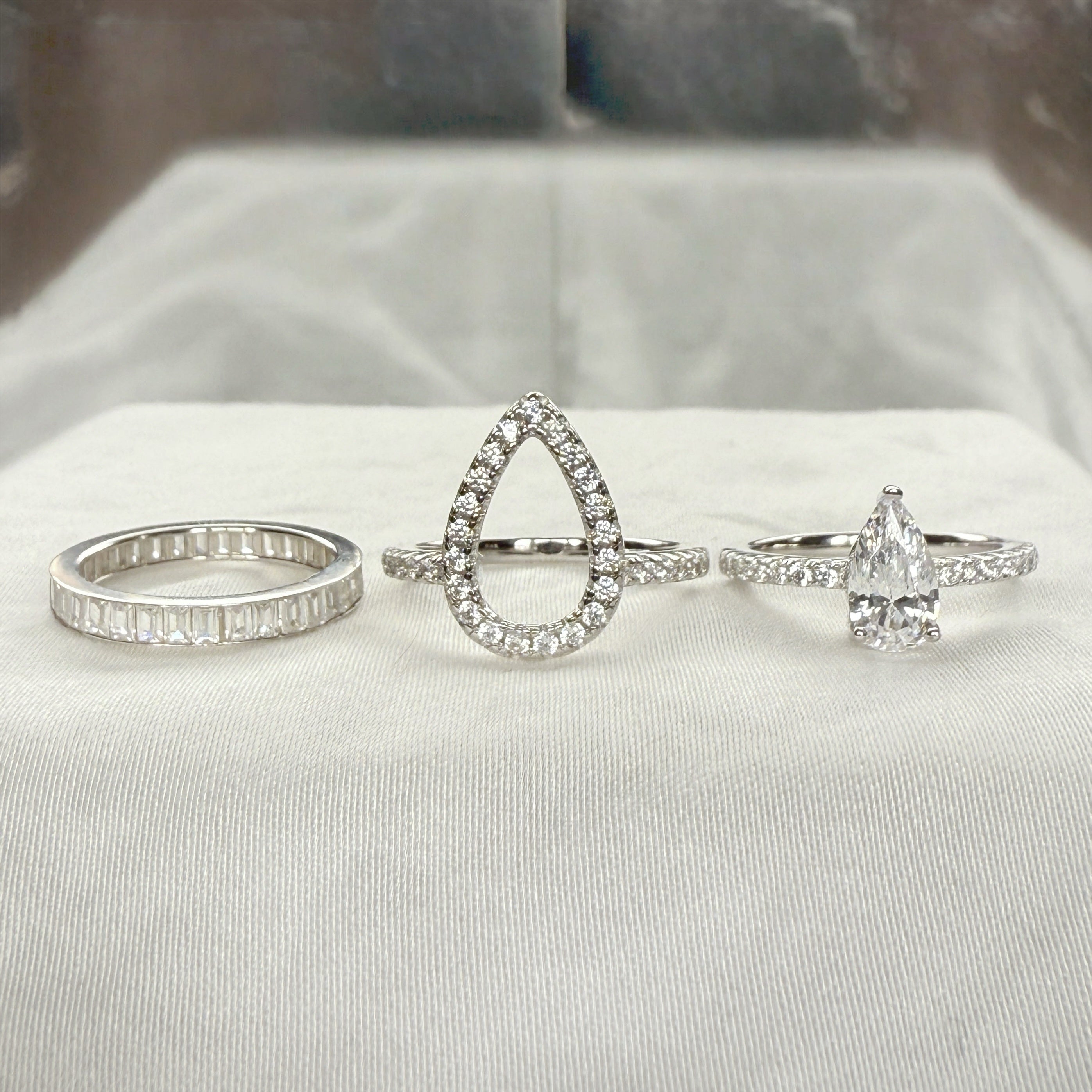 Trinity Glow 1.5 Carat Pear Cut 3-Piece Wedding Set in Sterling Silver