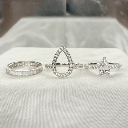 Trinity Glow 1.5 Carat Pear Cut 3-Piece Wedding Set in Sterling Silver
