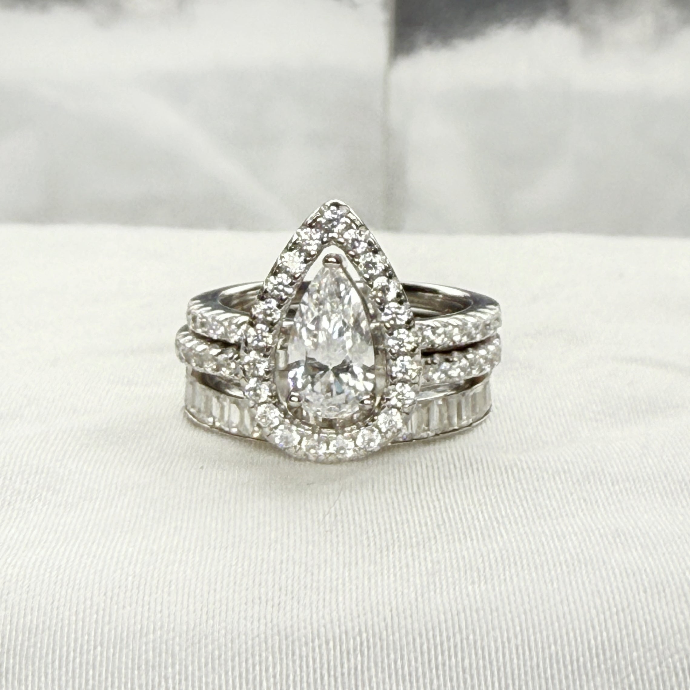 Trinity Glow 1.5 Carat Pear Cut 3-Piece Wedding Set in Sterling Silver