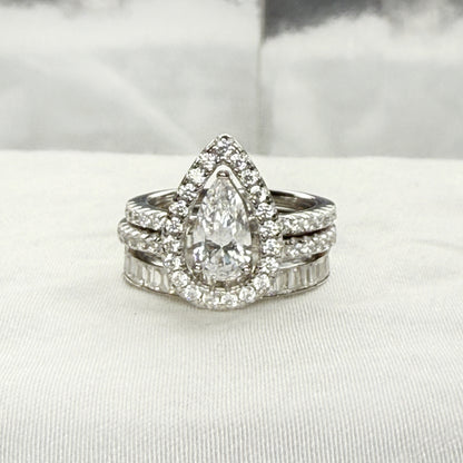 Trinity Glow 1.5 Carat Pear Cut 3-Piece Wedding Set in Sterling Silver