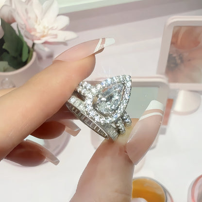 Trinity Glow 1.5 Carat Pear Cut 3-Piece Wedding Set in Sterling Silver