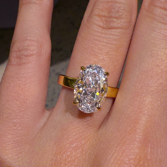 Balanced Elegance 3Ct Oval Cut Simulated Diamond Engagement Ring in White Gold Plated Silver