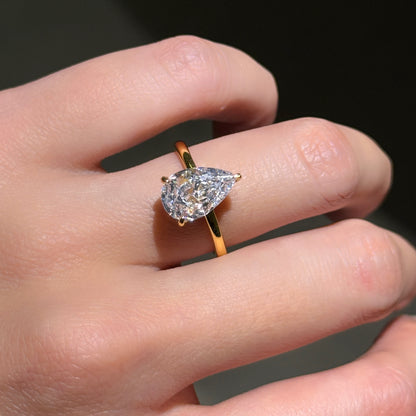 Golden Teardrop 2Ct Pear Cut Simulated Diamond Engagement Ring in Yellow Gold Plated Silver