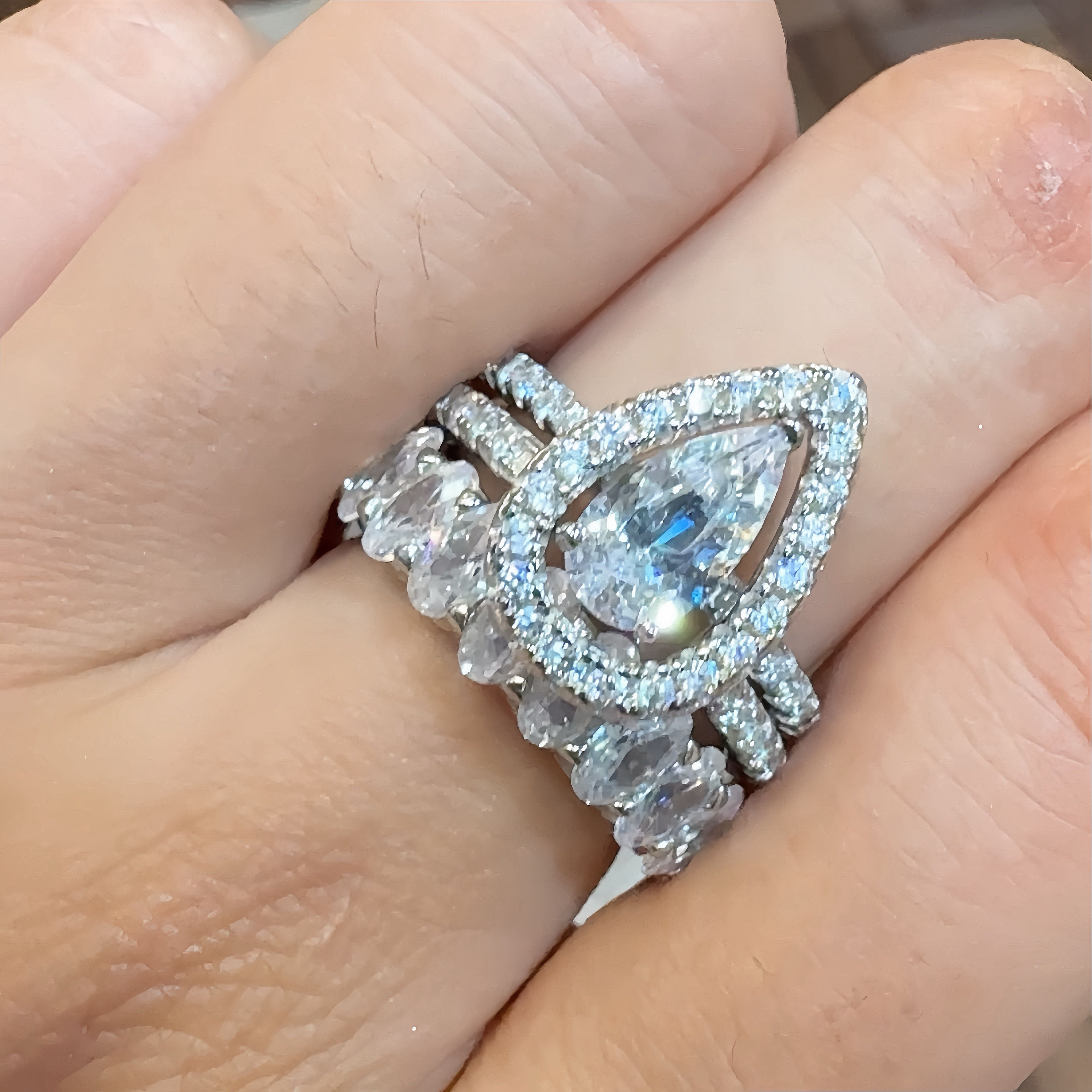 Dazzling Pear 1.5 Carat Pear Cut 3 - Piece Ring Set in Sterling Silver